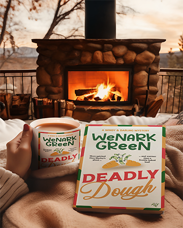 Deadly Dough paperback in front of winter fire